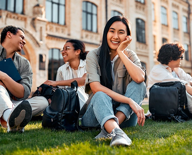university college student hanging out with friends on campus