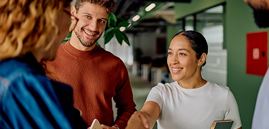 A young couple meeting with a financial professional