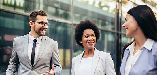 commercial real estate business people walking outside building