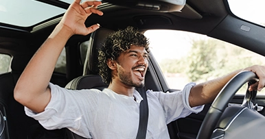 young man taking a joyride in his vehicle