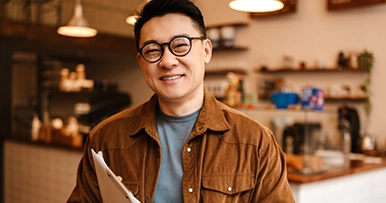 Confident entrepreneur smiling