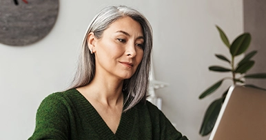 mature woman using laptop